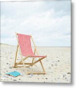 Deck Chair With Book On Sand At Beach Metal Print