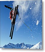 Downhill Skier In Mid-air, Rear View Metal Print