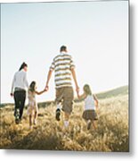 Family Walking Together In Rural Field Metal Print