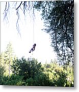Girl Swinging On Rope Swing At Forest Against Clear Sky Metal Print
