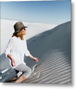 Hiker Climbing On Desert At White Sands National Monument During Sunny Day Metal Print