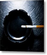 Lit Cigarette And Ashtray On Stainless Metal Print