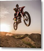 Motocross Rider Performing High Jump Metal Print