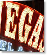 Neon Sign Displaying Vegas Metal Print