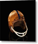 Old Football Helmet On Black Background Metal Print