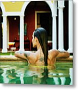 Rear View Of Woman Relaxing On Edge Metal Print