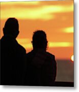 Silhouetted Old Couple Staring At The Sunset Metal Print