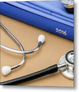 Stethoscope Next To A Book Metal Print