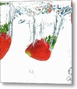 Strawberries Dropping Into Water Metal Print