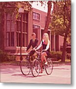 Teenage Couple Riding Bicycles Past Metal Print