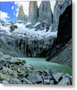 The Rugged Windswept Towers Over Turquoise Glacial Water Metal Print