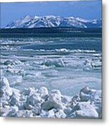View Over A Frozen Lake With Crushed Ice Metal Print
