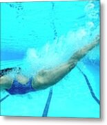 Woman Diving In Swimming Pool Metal Print