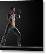 Young Woman Practising Karate, Close-up Metal Print