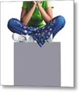 A Younng African American Girl In Jeans And A Green Shirt Sits With Her Legs Crossed Atop A Blank Sign Metal Print