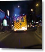 Ambulance Driving On Street At Night Metal Print