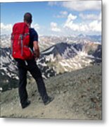 An Adult Male Looks Out Over A Mountain Range Alone On A Remote Mountain Trail Metal Print