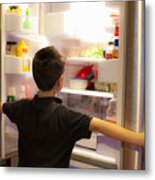 Asian Boy Searching Through Refrigerator Metal Print