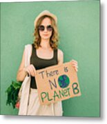 Beautiful Blonde Girl Holding There Is No Planet B Over Green Background Metal Print