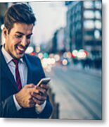 Businessman Texting Outdoors In The Evening Metal Print