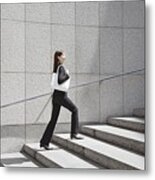 Businesswoman Walking Up Steps Metal Print