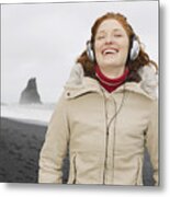 Caucasian Woman Listening To Headphones On Beach Metal Print