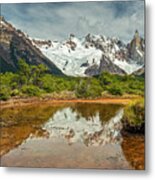 Cerro Torre Reflecting In A Pond Metal Print