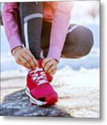 Close Up Of Caucasian Sporty Woman Crouching Outdoors In Sportswear And Tying Shoelace. Winter Fitness Concept. Metal Print