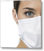 Close Up Portrait Of A Young Adult Female Nurse In A Mask As She Looks At The Camera Metal Print