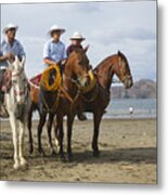 Costa Rican cowboys on the beach in Playas del Coco Metal Print