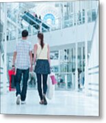 Couple Carrying Shopping Bags In Mall Metal Print