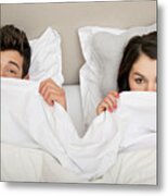 Couple In Bed Peeking Behind Duvet Metal Print