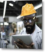 Engineer Using Tablet And Working In Factory Metal Print