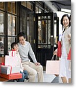 Family Including Boy And Girl (6-13) Sitting Outside Store Metal Print