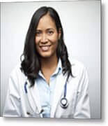 Female Doctor Smiling Over White Background Metal Print