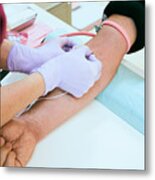 Female Nurse Is Taking Blood Of A Senior Patient At Hospital. Metal Print