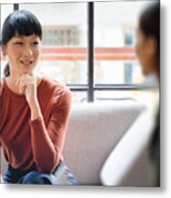 Female Young Asian Entrepreneur Smiling And Discussing Ideas With Colleague Metal Print