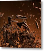 Flying Pieces Of Crushed Chocolate Pieces Metal Print