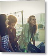 Friends Sharing A Laugh On Urban Rooftop Metal Print