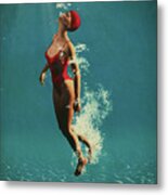 Girl Swimming Underwater Metal Print