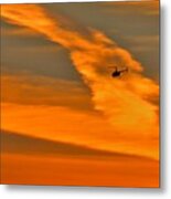 Helicopter Approaching At Sunset Metal Print