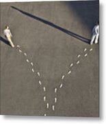 Man And Woman With Diverging Line Of Footprints Metal Print