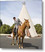 Man On Horse In Front Of Tepee-shaped Motel Unit. Metal Print