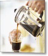 Man Pouring Coffee From Cafetiere In To Mug, Close-up, Mid Section Metal Print