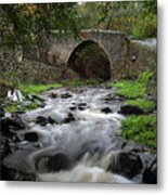 Medieval Stoned Bridge Water Flowing In The River. Metal Print