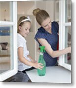 Mother And Daughter Cleaning Window Metal Print