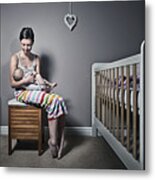 Mother Cradling Baby Metal Print