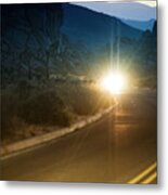 Oncoming Headlights From A Car On Desert Road Metal Print