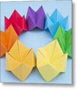 Paper Fortune Tellers arranged by colour on a blue background Metal Print