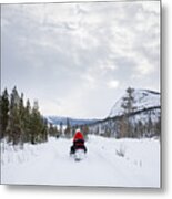People Drive Snowmobiles On A Mountain In Rural Norway, Wintertime Metal Print
